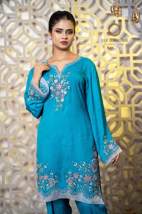 Cotton silk kameez with multi color embroidery on neck sleeve